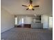 View from living room into open concept kitchen and dining area at 275 Magnolia Run Way, Benson, NC 27504
