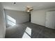 Spacious bedroom with neutral carpet, a ceiling fan, and lots of natural light at 275 Magnolia Run Way, Benson, NC 27504