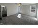 Spacious main bedroom with neutral carpet, ceiling fan, and lots of natural light at 275 Magnolia Run Way, Benson, NC 27504