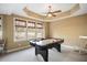Recreation room with an air hockey table, natural light, and neutral paint at 2933 Elmfield St, Raleigh, NC 27614