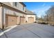 Spacious three-car garage with concrete driveway and extra parking at 2933 Elmfield St, Raleigh, NC 27614