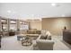 Relaxing living room with a pool table, tan sofa and recessed lighting at 2933 Elmfield St, Raleigh, NC 27614