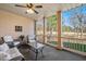 Covered patio featuring wicker furniture and views of the backyard at 2933 Elmfield St, Raleigh, NC 27614