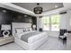 Beautiful main bedroom with a decorative light fixture and modern furniture at 294 Arcadius Dr, Clayton, NC 27520