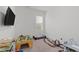 Empty bedroom with a window, carpet and a ceiling fan at 3012 Freeman Farm Way, Rolesville, NC 27571