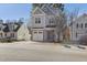 Charming two-story home with stone accents, a one-car garage, and a well-maintained front yard in a Gathering-friendly neighborhood at 305 Harwood St, Apex, NC 27502