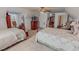 Spacious bedroom featuring two beds, neutral carpet and charming decor at 3134 Magnolia Ln, Stem, NC 27581