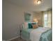 Tastefully decorated bedroom featuring stylish decor and lots of natural light at 314 Church St # 37, Wendell, NC 27591