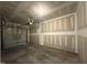 Spacious two car garage with smooth concrete floors and prepped, unfinished walls and ceiling at 314 Church St # 37, Wendell, NC 27591