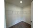 Walk-in closet with wire shelving offers ample space for storage at 314 Church St # 37, Wendell, NC 27591