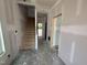 A new construction entryway featuring a staircase and open layout at 315 Chesapeake Commons St # 102, Garner, NC 27529