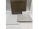 Samples of interior design materials showcasing cabinet, floor, and countertop options at 315 Chesapeake Commons St # 102, Garner, NC 27529