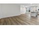 Spacious open-concept living area featuring hard surface floors and a kitchen view at 318 Church St # 39, Wendell, NC 27591