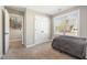 Bedroom featuring a single bed and a closet filled with medals and trophies at 329 Silver Creek Dr, Clayton, NC 27520