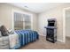 Bedroom featuring an arcade machine next to a bed with pillows at 329 Silver Creek Dr, Clayton, NC 27520