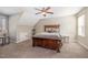 Spacious bedroom with a ceiling fan, natural light, and modern decor at 329 Silver Creek Dr, Clayton, NC 27520