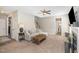 Inviting living room featuring neutral walls, plush carpeting, and a cozy fireplace at 329 Silver Creek Dr, Clayton, NC 27520