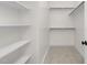 Walk-in closet with adjustable shelves, and carpeted floor at 344 Church St, Morrisville, NC 27560