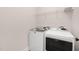 Laundry room featuring modern, matching washer and dryer at 344 Church St, Morrisville, NC 27560
