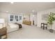 Comfortable main bedroom featuring soft carpet, natural lighting, and stylish decor at 344 Church St, Morrisville, NC 27560