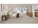 Tranquil main bedroom features soft carpet, a plush bed, natural light, and elegant decor at 344 Church St, Morrisville, NC 27560