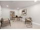 A well-lit and decorated office with a shelf and two chairs at 344 Church St, Morrisville, NC 27560