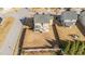 A stunning aerial view of the home highlighting the backyard, fence and neighborhood at 372 Lynshire Ave, Clayton, NC 27527
