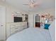 Bedroom with a large dresser, plush carpet, and modern decor at 372 Lynshire Ave, Clayton, NC 27527