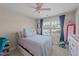 This cozy bedroom features a comfortable bed, bright natural light, and playful decorations at 372 Lynshire Ave, Clayton, NC 27527