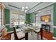 Bright dining room with modern decor and a view to the street at 372 Lynshire Ave, Clayton, NC 27527