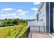 This new home boasts a spacious deck offering stunning views of the surrounding landscape at 509 Sherron Rd # 22, Durham, NC 27703