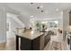 Spacious kitchen featuring a large island, stainless steel appliances, and open layout at 509 Sherron Rd # 22, Durham, NC 27703