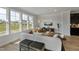 Bright living room with large windows, a cozy sofa, and tasteful decorations at 509 Sherron Rd # 22, Durham, NC 27703