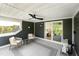 Inviting covered patio with comfortable seating, ceiling fan, and scenic outdoor views at 509 Sherron Rd # 22, Durham, NC 27703