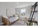 Cozy bedroom features a window view, desk and a comfortable daybed at 509 Sherron Rd # 25, Durham, NC 27703