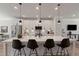 Spacious kitchen island features pendant lighting, bar stool seating, and modern appliances at 509 Sherron Rd # 25, Durham, NC 27703