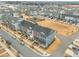 Aerial view of a neighborhood showcasing townhomes with front porches and modern designs at 6012 Kayton St, Raleigh, NC 27616