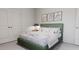 Bright bedroom featuring a comfortable bed, clean white linens, and ample natural light for a serene atmosphere at 629 Emerald Bay Cir, Raleigh, NC 27610