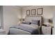 Comfortable bedroom featuring a large bed, stylish decor, and soft lighting for a peaceful and inviting atmosphere at 629 Emerald Bay Cir, Raleigh, NC 27610