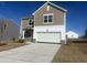 Newly built two-story home with a two-car garage in a residential neighborhood at 1137 Centerview Dr, Nashville, NC 27856