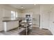 Bright kitchen with stainless steel appliances, white cabinetry and modern countertops at 1137 Centerview Dr, Nashville, NC 27856
