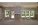 Bright living room with ample natural light and a door leading to the outside at 1240 Dimaggio Dr # 35, Raleigh, NC 27616