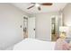 Bedroom featuring ceiling fan, carpet floors, neutral walls, and modern lighting at 1620 Oakland Hills Way, Raleigh, NC 27604