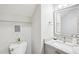 Clean and simple half bathroom featuring modern fixtures and a vanity at 1620 Oakland Hills Way, Raleigh, NC 27604