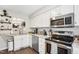 Well-equipped kitchen with stainless steel appliances and granite countertops at 1620 Oakland Hills Way, Raleigh, NC 27604