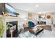 Cozy living room with a fireplace, modern decor, and comfortable seating at 1620 Oakland Hills Way, Raleigh, NC 27604