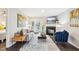 Stylish living room with fireplace and view of french doors to a patio at 1620 Oakland Hills Way, Raleigh, NC 27604