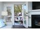 Bright living room featuring patio doors leading to an outdoor seating area at 1620 Oakland Hills Way, Raleigh, NC 27604