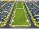 Aerial view of green space common area surrounded by houses in a community at 21 Nimble Way # 176, Clayton, NC 27520