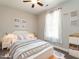Bright and cozy bedroom featuring white furniture and decor at 2218 Christian Light Rd, Fuquay Varina, NC 27526